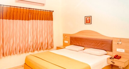 The Abirami Residency Room Type - Deluxe Room with Air Conditioning