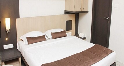 Hotel Monarch Guestline in MIDC Rabale Room Type - Deluxe Room