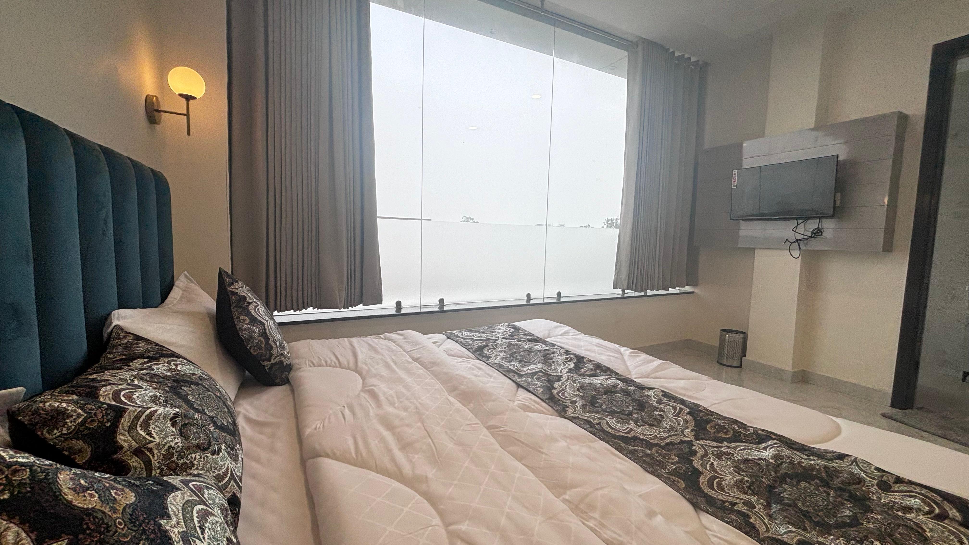 Blu Breeze Hotel - Tap to explore photos