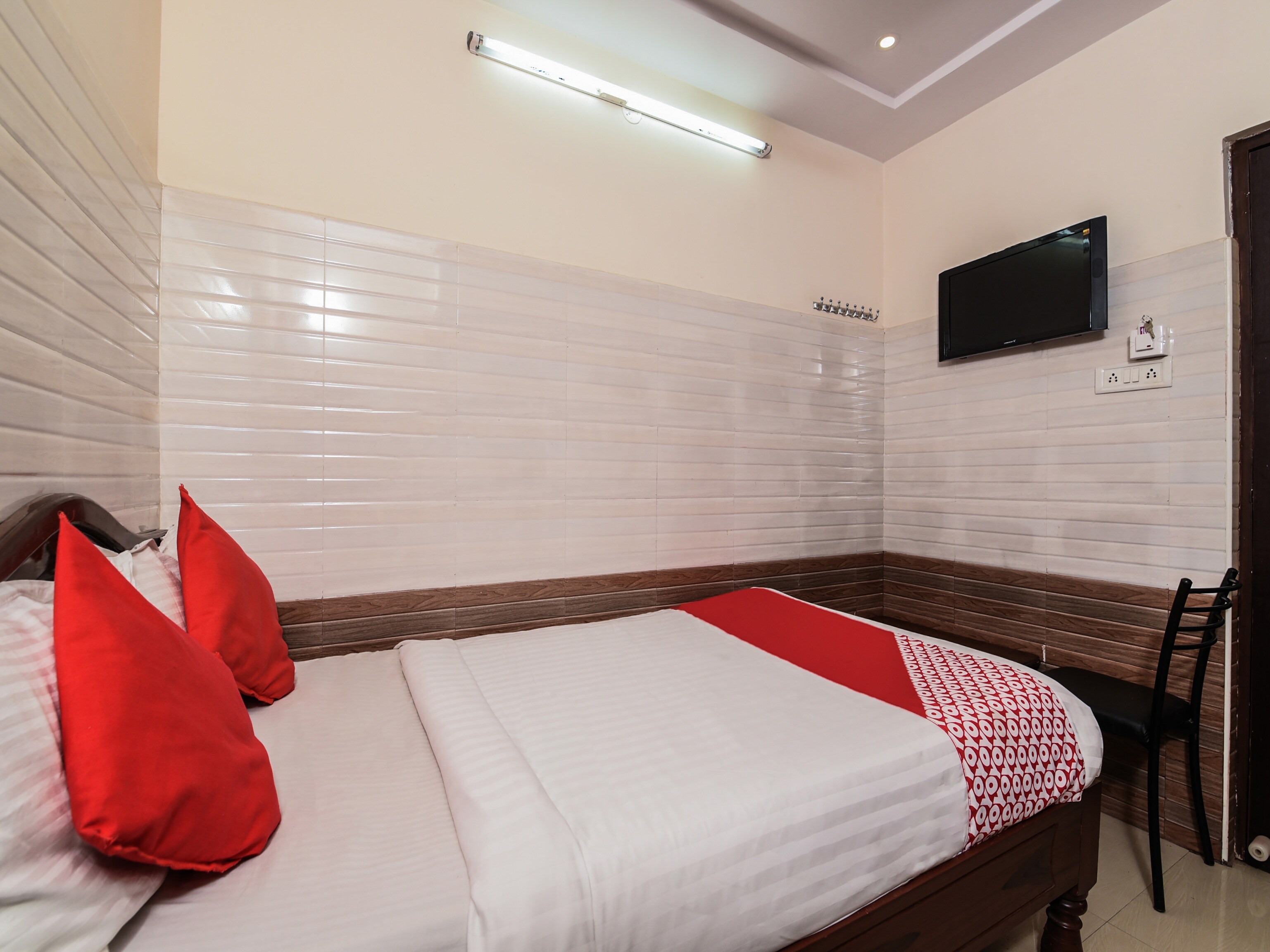 Hotel O Varsha Grand Residence - Tap to explore photos