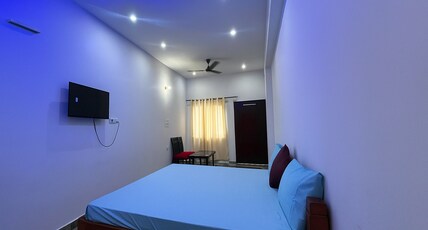 The Breeze Home Stay Room Type - Deluxe Room with Air Conditioning
