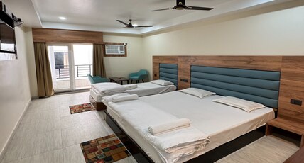 Hotel M Plaza New Digha Room Type - Deluxe Triple Room (Building View) With Balcony