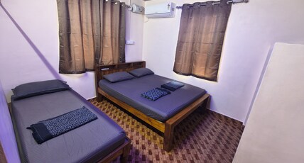 Adiga's Homestay Dharmasthala Room Type - Family Suite Room with Balcony (AC) Adiga's Homestay Dharmasthala Room Type - Family Suite Room with Balcony (AC)