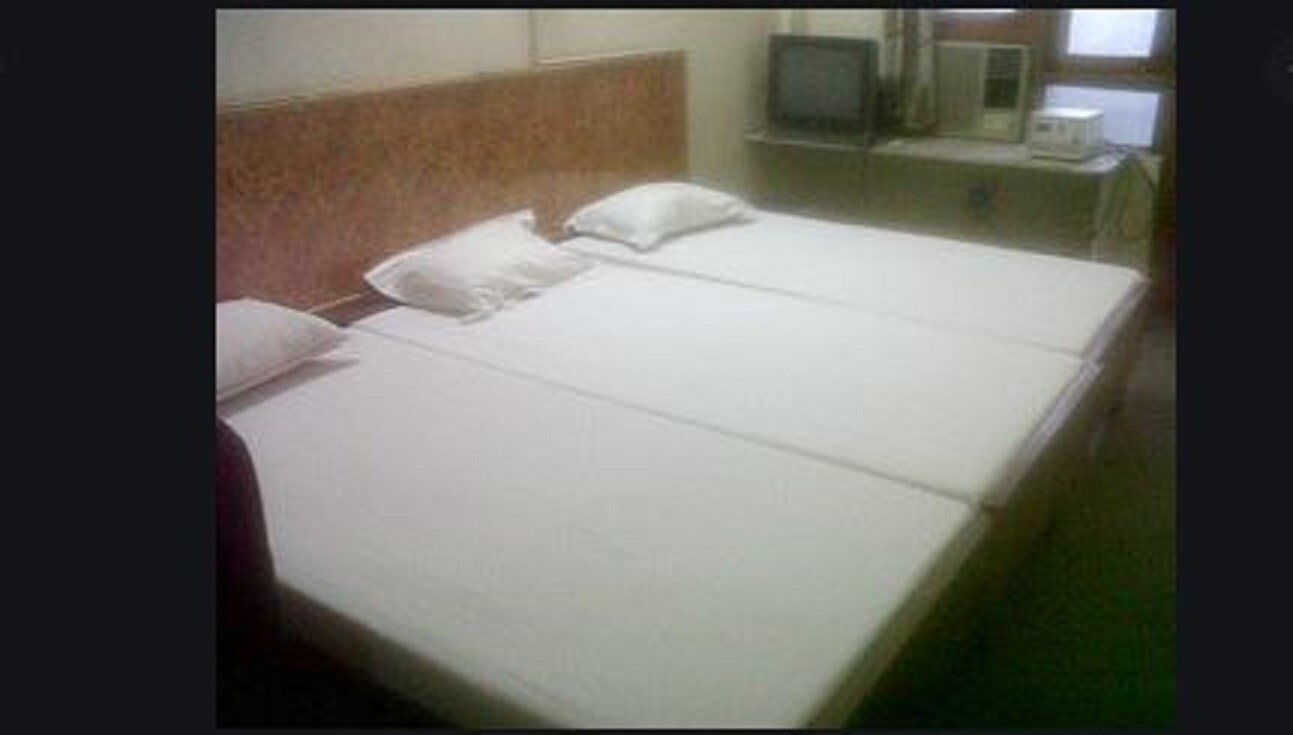 Hotel Archana - Tap to explore photos