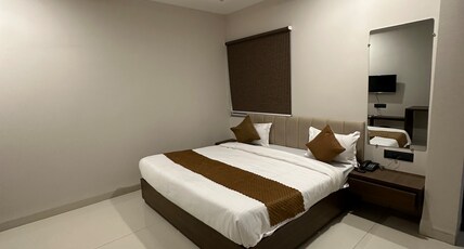 MADHURAM Room Type - Deluxe Room with Bathtub
