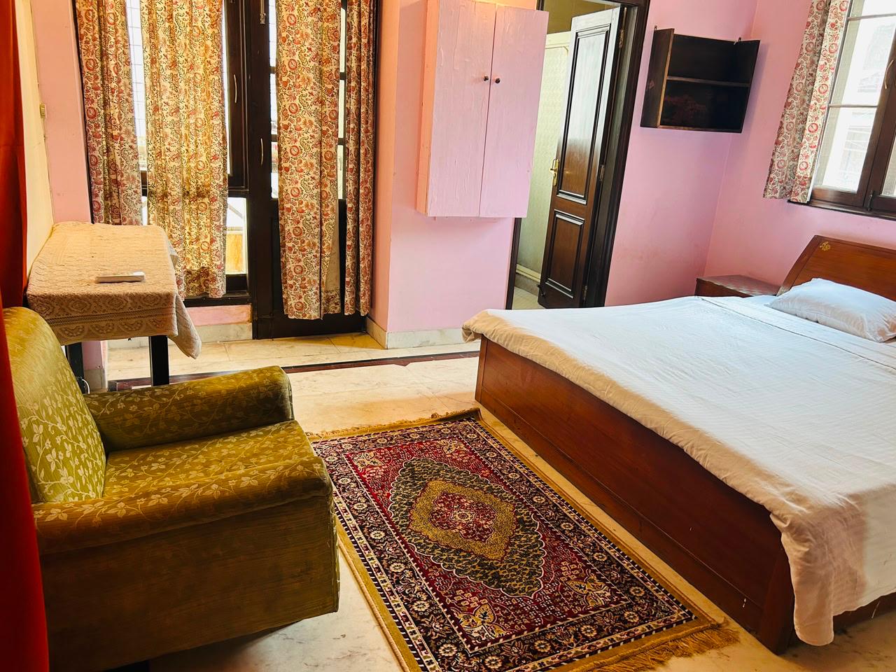 Dr. Bali's Bliss Homestay - Tap to explore photos