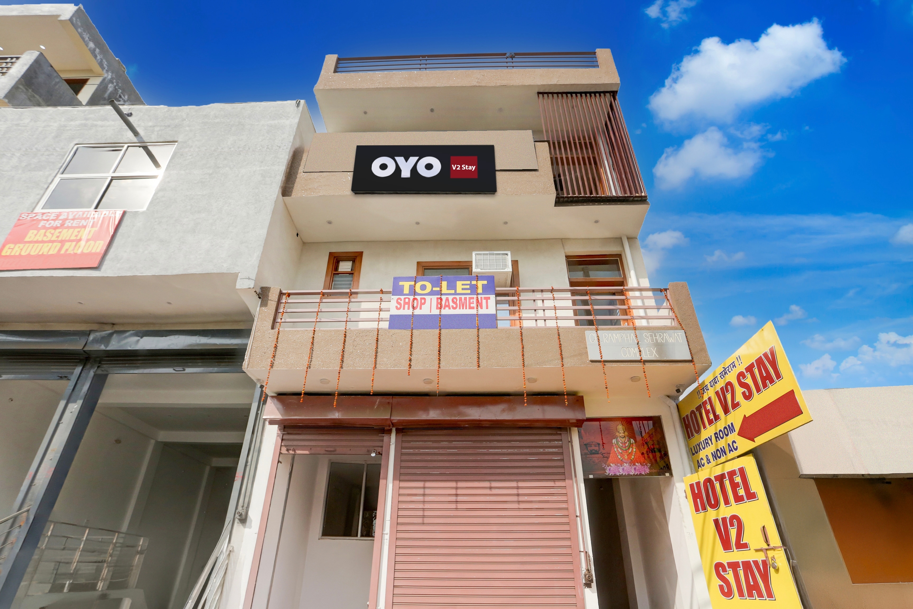 Hotel O V2 Stay - Tap to explore photos