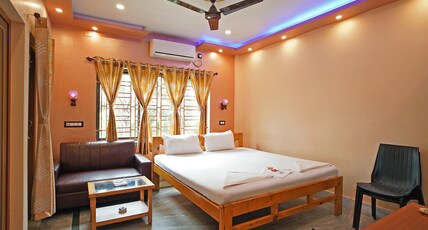 Whispering Woods Inn Room Type - AC Super Deluxe Balcony Room