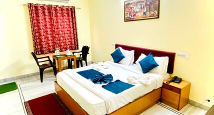 Hotel Dimple International  Room Type - Deluxe Room