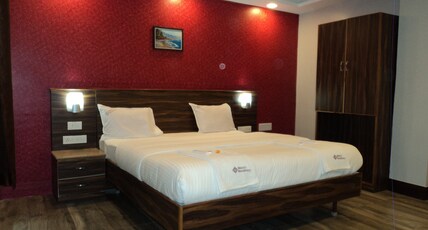 Mani's residency  Room Type - Deluxe AC Room