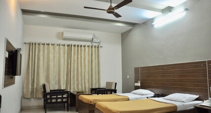 HOTEL SREE VIJAYALAKSHMI - (Previously Hotel Dolphin Inn) Room Type - Double AC Room