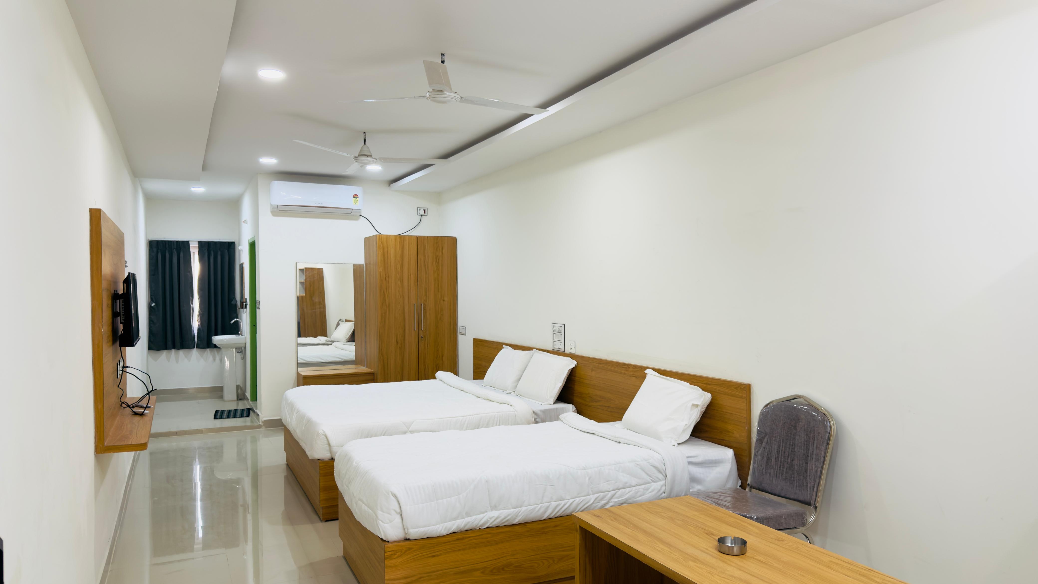 SRI HARSHA A/C LUXURY ROOMS - Tap to explore photos