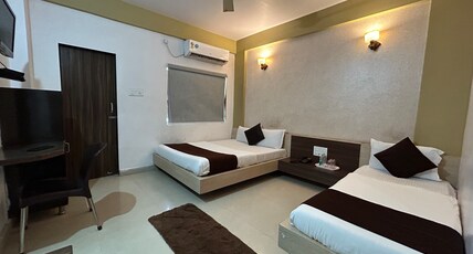Hotel Somnath Atithigruh Room Type - 3 Bedded Family AC Room