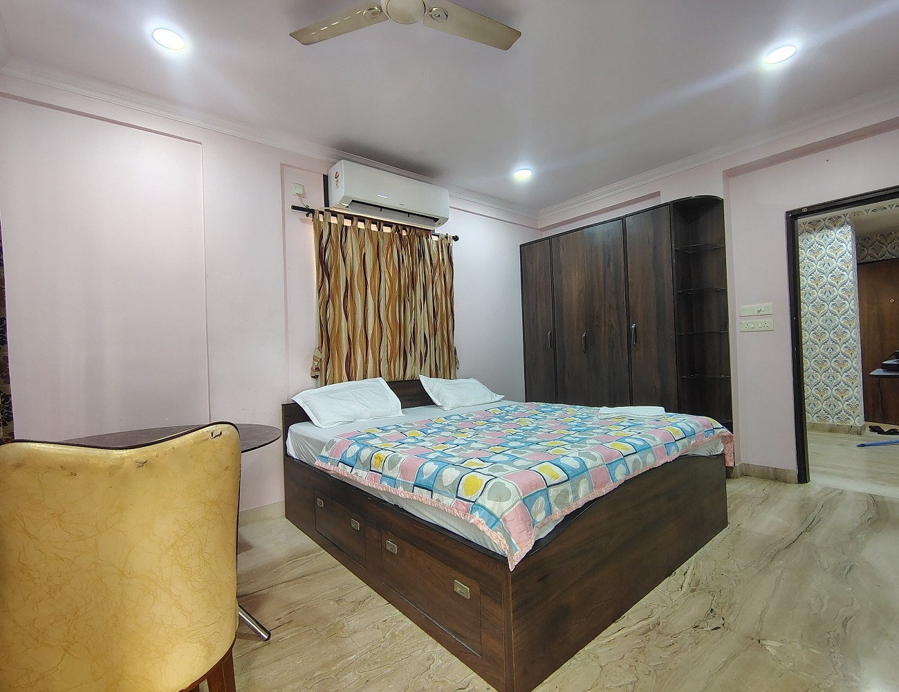 Star Spandan Inn Near Axis Mall - Tap to explore photos