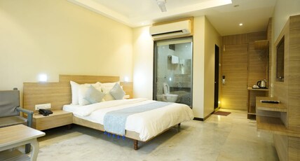 Hotel Hrushikesh. Room Type - Deluxe Double Bed With Bath Tub.