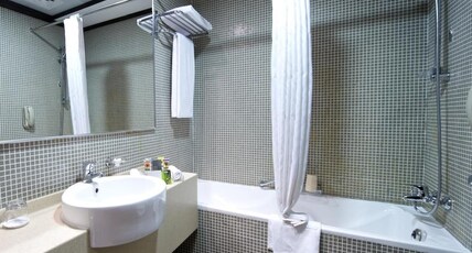 TIME Oak Hotel & Suites Room Type - Deluxe King Room