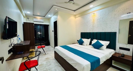 Hotel Vanvira Room Type - Hill Facing Deluxe Room with Attached Balcony Hotel Vanvira Room Type - Hill Facing Deluxe Room with Attached Balcony