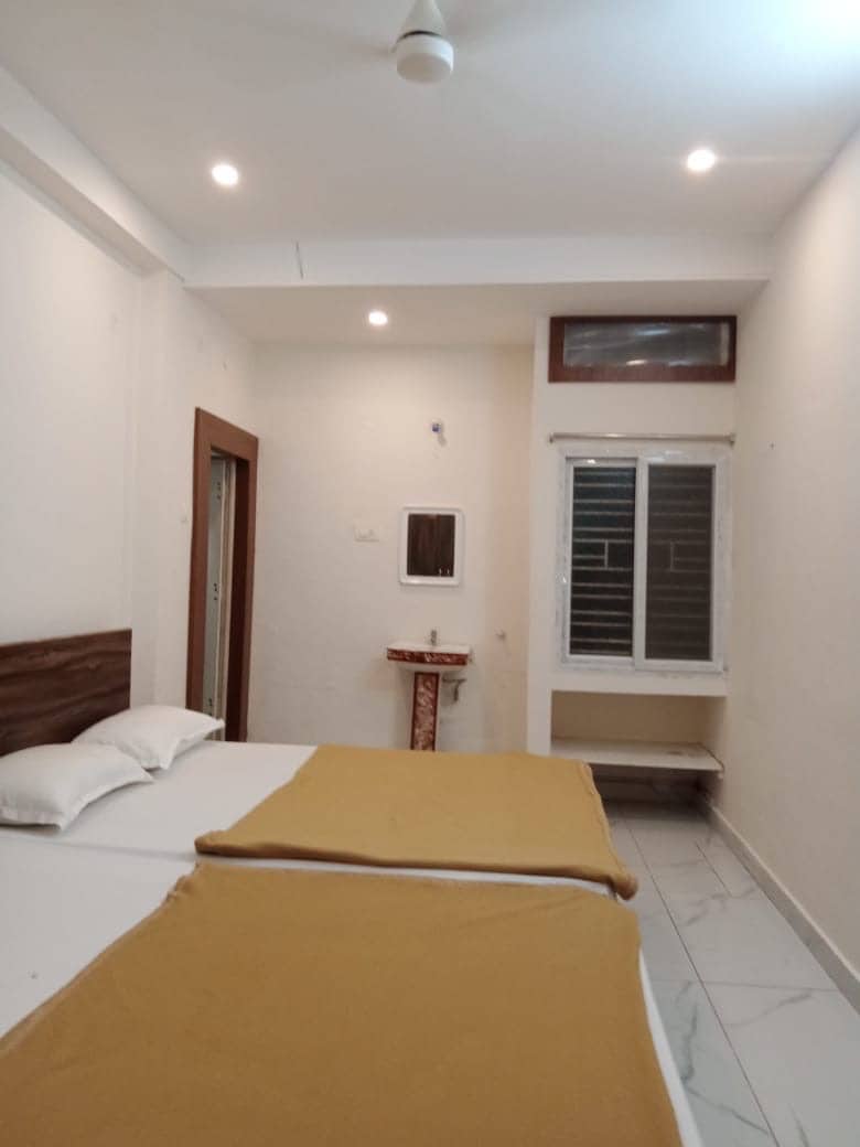 SVR GUEST HOUSE PUTTAPARTHI - Tap to explore photos