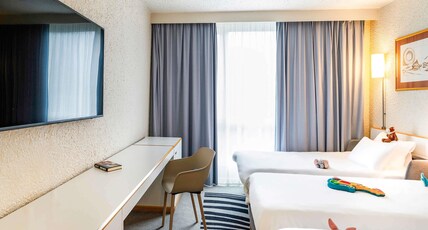 Novotel Valenciennes Room Type - Classic Room with twin beds and 1 single sofa bed Novotel Valenciennes Room Type - Classic Room with twin beds and 1 single sofa bed