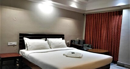 Hotel Pulikeshi. Room Type - Deluxe Double Room