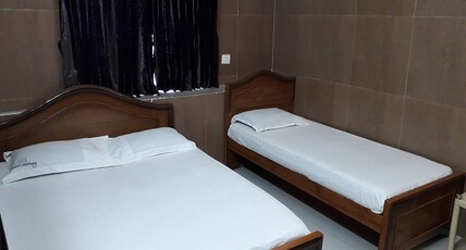 Vasavi Cottage Room Type - Deluxe Triple Bedroom AC