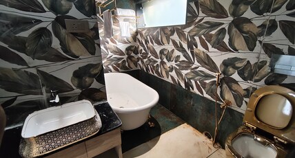 Sky Deckz (A Unit of Q Hexa Multi Venture Pvt. Ltd.) Room Type - Deluxe room with a bath tub and modern amenities Sky Deckz (A Unit of Q Hexa Multi Venture Pvt. Ltd.) Room Type - Deluxe room with a bath tub and modern amenities