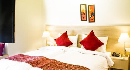 Starlit Suites Room Type - Premium Studio With Kitchenette Living Area and Balcony