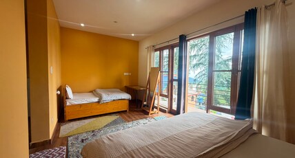 Flyscape Hostel Room Type - Triple Bed Room with Mountain View and Balcony