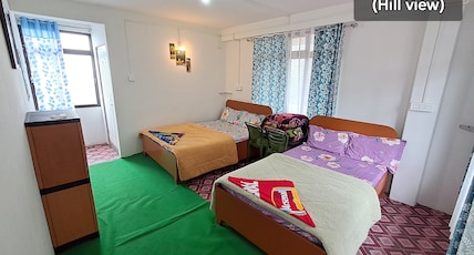 TAPOVAN HOME STAY Room Type - Deluxe Room with Balcony and Mountain View TAPOVAN HOME STAY Room Type - Deluxe Room with Balcony and Mountain View