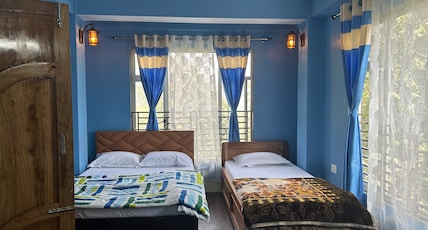 RUDRANSH HOMESTAY Room Type - Femily room 102