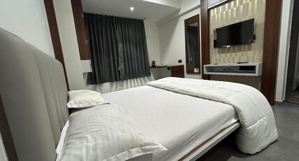 HOTEL URBAN IN LUXURY LODGING Room Type - Deluxe Room Non Ac