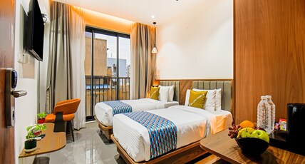 Palette Hotel And Residences by CheckIn, Baner Pune Room Type - Standard Twin Bed Room with Common Living Area