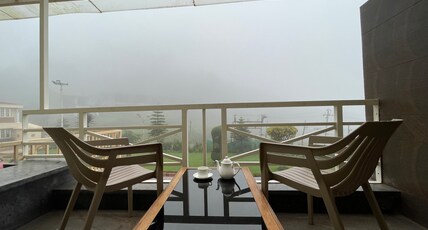 Delightz Inn Room Type - Studio Garden-View with Balcony