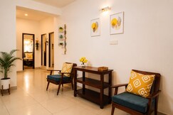 Bright yellow 2BHK with balcony 2 km WhiteTown - Topaz