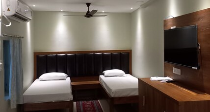 Raghunandan Residency Puri Room Type - Twin Bed Super Deluxe Room ( Bathroom is private but not in suite ) Raghunandan Residency Puri Room Type - Twin Bed Super Deluxe Room ( Bathroom is private but not in suite )