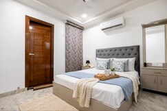 Rooms of Igloo | Near Taj |3BR  By Homeyhuts