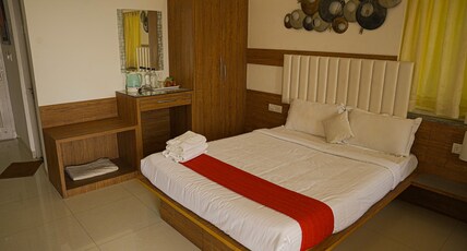 Peach county rooms by Lets Inn Room Type - Deluxe Room