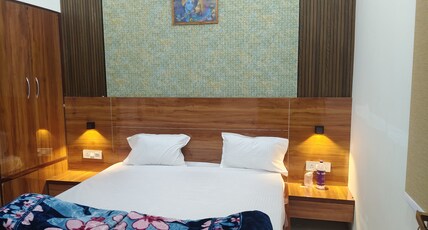 MADHAVI GRAND Room Type - Deluxe Room 104 (Chitra)