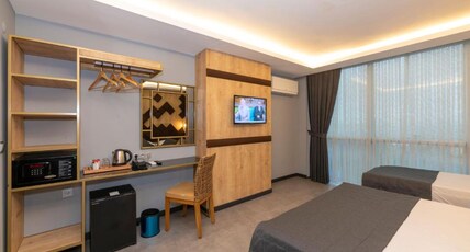 Fly And Stay Airport Hotel Room Type - Deluxe Triple Room Fly And Stay Airport Hotel Room Type - Deluxe Triple Room