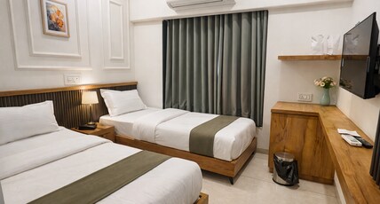 Raw Leaves  Premium Family & Business Hotel Near Rajkot Railway Station Room Type - ROYAL COMFORT