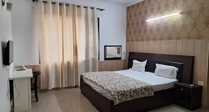 Hotel Star Residency Near Medanta Hospital Room Type - Star Medicity Room with garden view Hotel Star Residency Near Medanta Hospital Room Type - Star Medicity Room with garden view