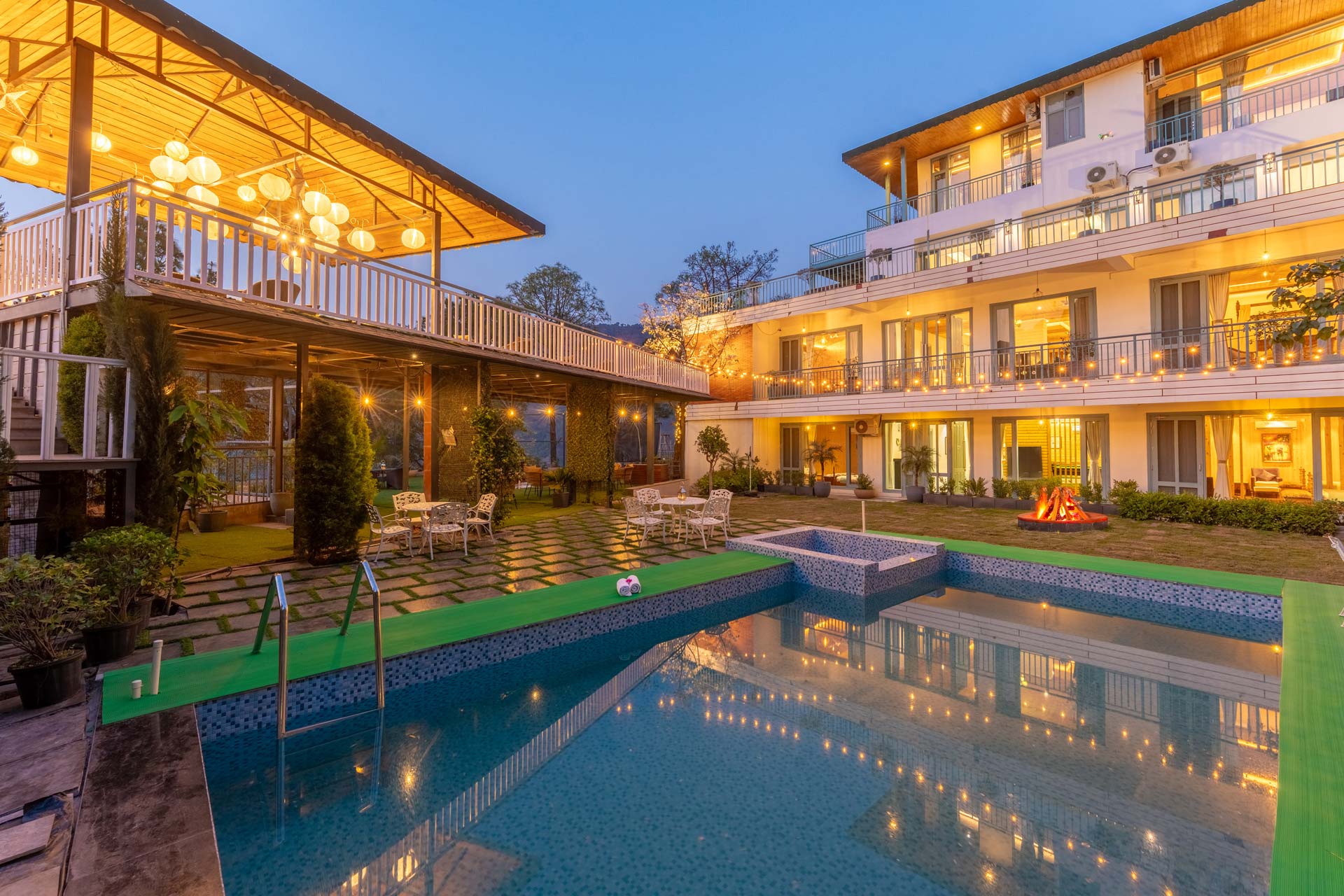 StayVista at Utopia @ Aurellia Summit w/ Outdoor Pool - Tap to explore photos