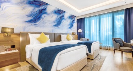  Movenpick Grand Al Bustan Room Type - Classic Room with 2 single beds
