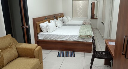 YATRISTAYINN Room Type - Family Room City View-2 King Beds