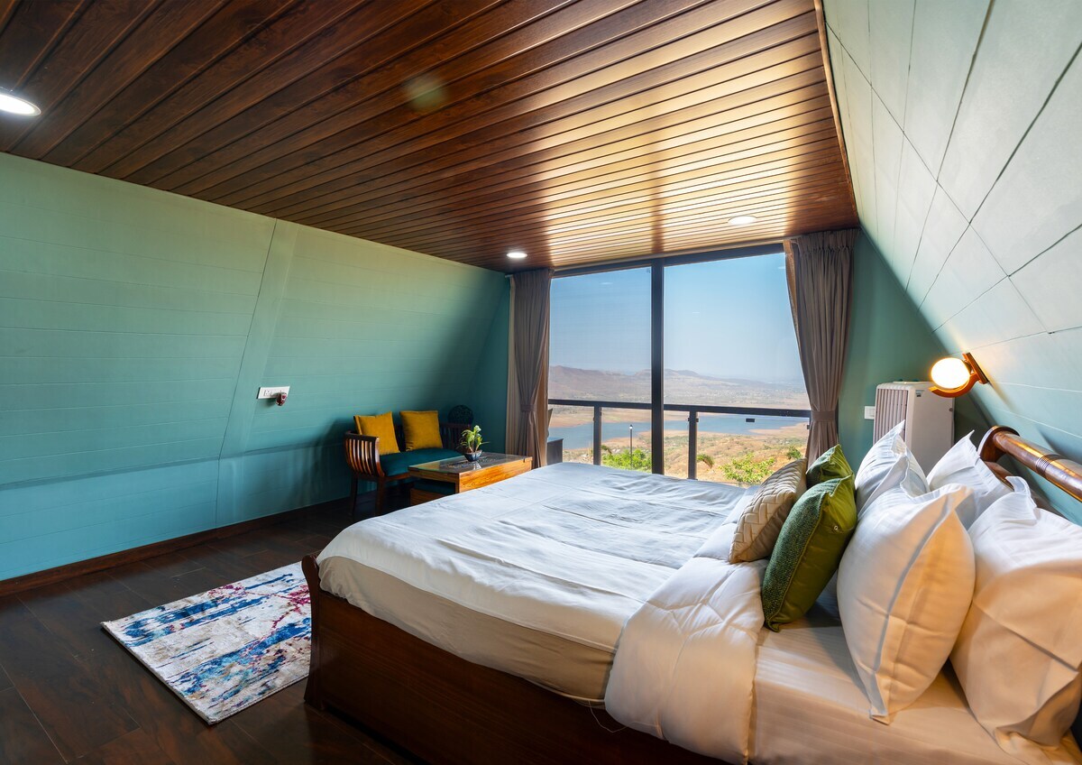 SKYGRAM STAYS CLOUD 1 1BHK WITH LAKE VIEW - Tap to explore photos