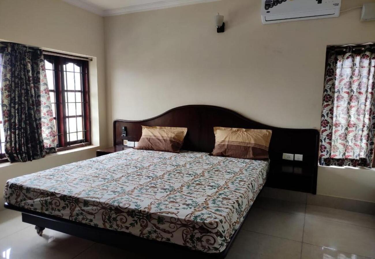 Deluxe Room in Nalanchira by Probity Ventures - Tap to explore photos
