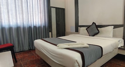 Kiara Eshosans Palace (100 meters From Sai Samadhi Temple) Room Type - Standard Double Bed Non AC Kiara Eshosans Palace (100 meters From Sai Samadhi Temple) Room Type - Standard Double Bed Non AC