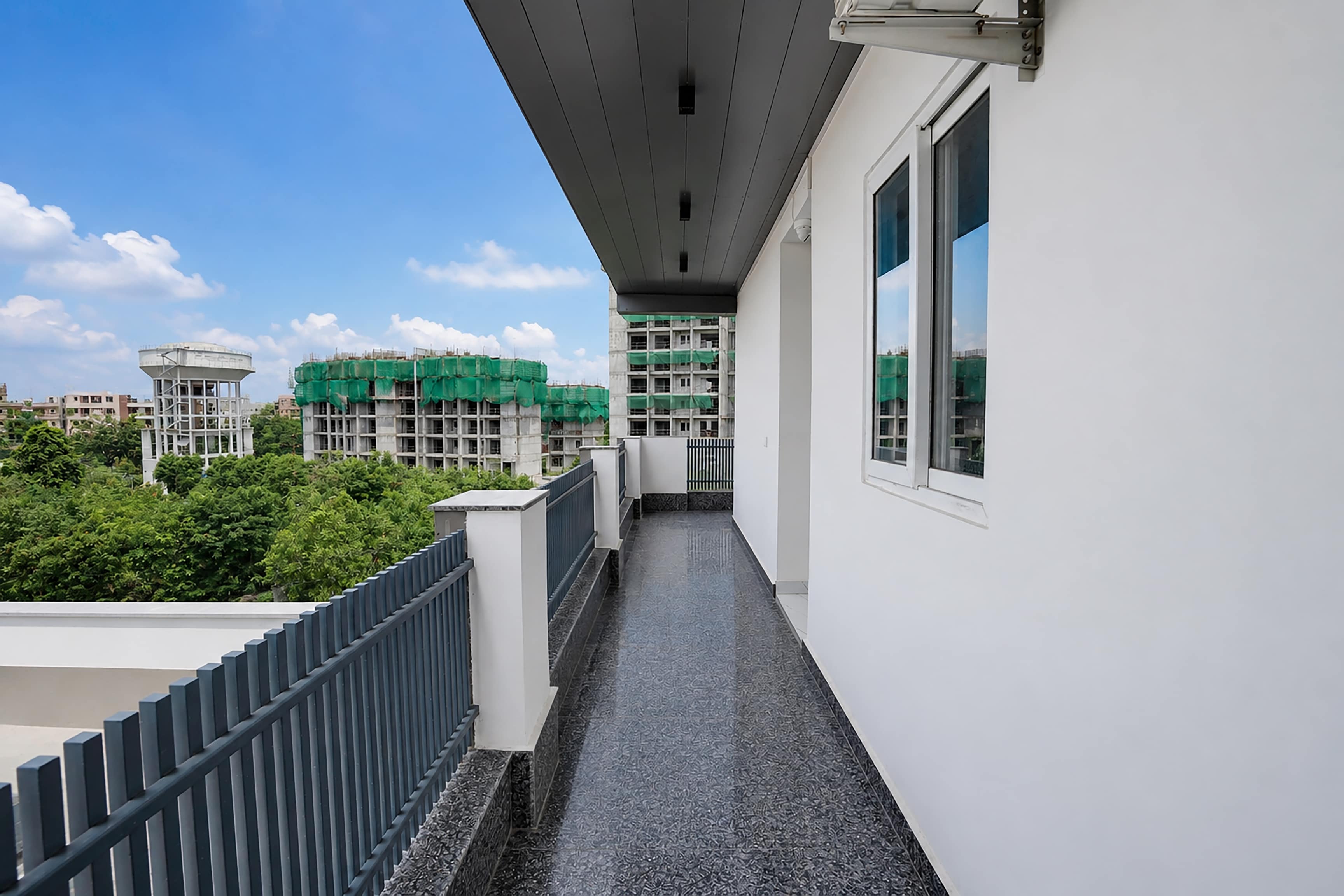Hotel Aroha A Corporate Suites Near Botanical Garden Metro Station - Tap to explore photos