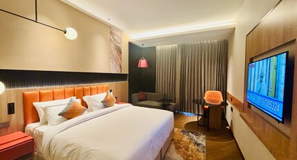 Ramada Encore By Wyndham Ayodhya Takpura Room Type - Premium king Bedded with Balcony