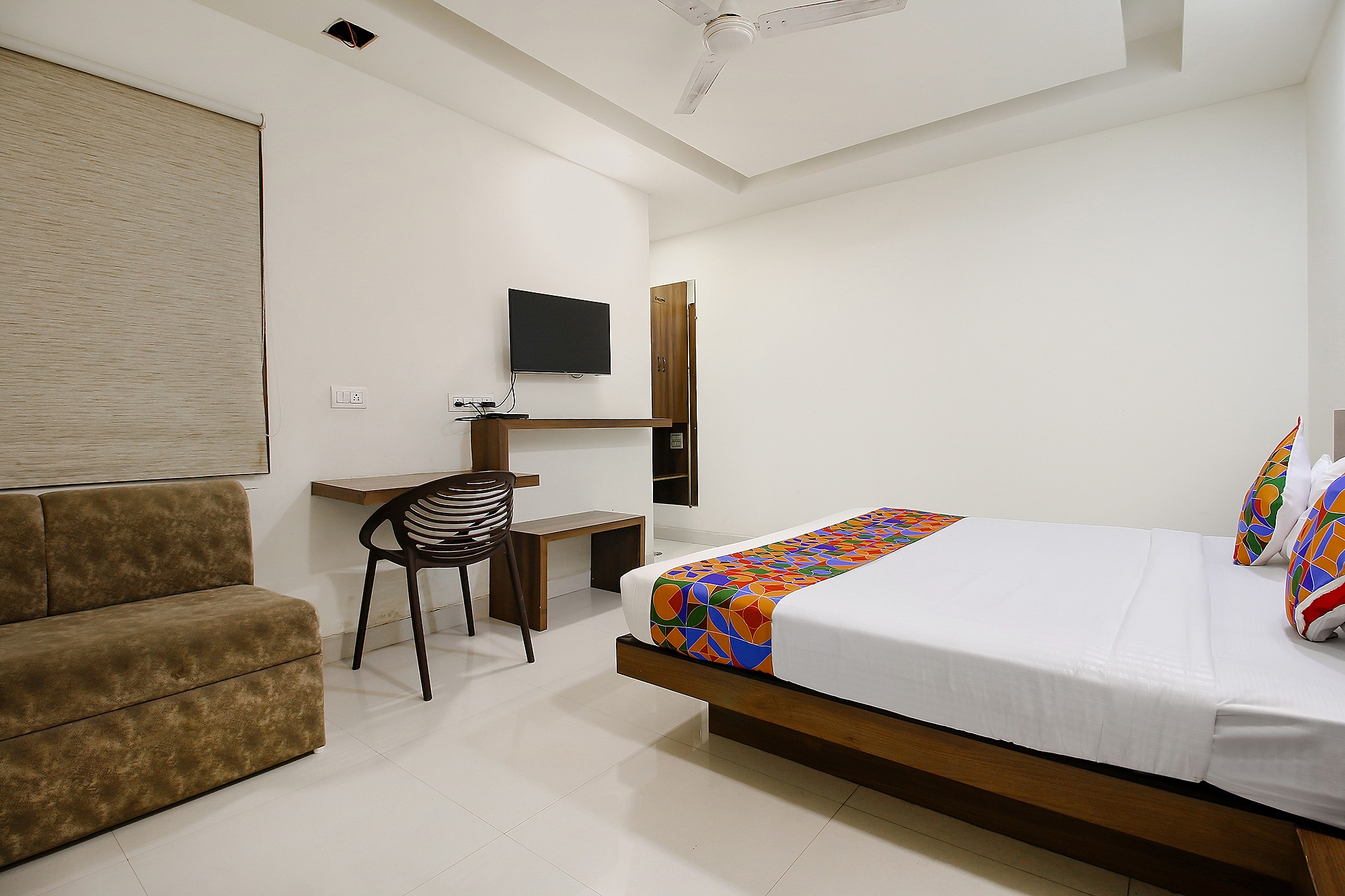 FabHotel Comfortable Stay - Tap to explore photos